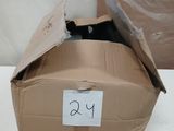a cardboard box with a cat inside of it on a table
