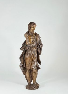 statue of a man with a dog on his shoulder