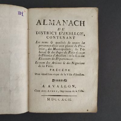 an open book with a black and white title on it