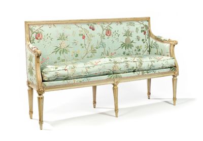 a couch that is sitting on a white surface