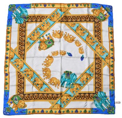 a square scarf with an image of elephants on it