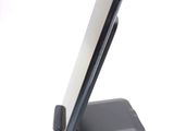 a cell phone that is sitting on top of a stand
