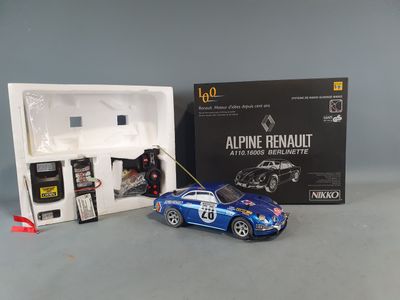 a toy car that is sitting in front of a box