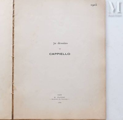 an open book sitting on top of a table next to a white wall