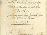an old document with writing on it sitting on top of a table
