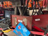 a lot of tools that are sitting under a table