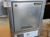 an image of a toaster oven sitting on a table