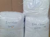 boxes of toilet paper stacked on top of each other in a box