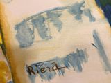a painting of an open book on a table