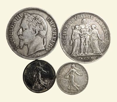 three different types of coins are shown on a white background