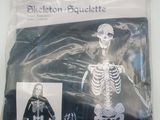 a plastic bag with a skeleton on it and a picture of a skeleton on it
