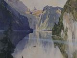 un tableau représentant un lac avec des montagnes en arrière-plan