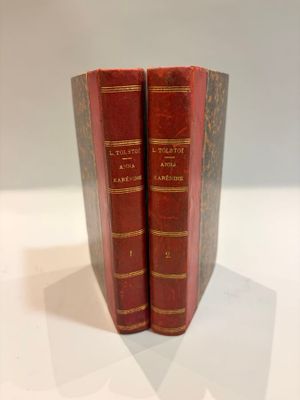 two books that are sitting on a white table