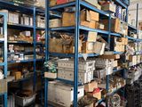 lots of boxes and boxes on the shelves in the warehouse