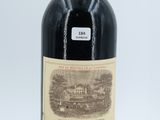 a bottle of wine that is sitting on a table
