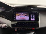 the dashboard of a car with a camera mounted to it ' s screen
