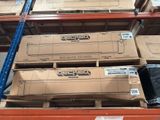 many boxes that are stacked on a shelf in a warehouse