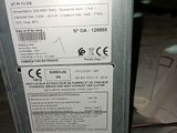 a label on the back of a machine that is sitting on the floor