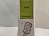 a box with a microphone inside of it on a table