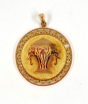 an image of a gold plated pendant with a horse and a vase on it