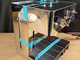a coffee machine that is sitting on a table