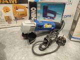 an image of a corded electric tool on a table