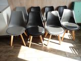 six chairs lined up in a row in a room