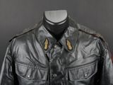 an image of a black leather jacket on a mannequin
