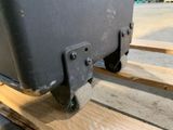 a piece of luggage that is sitting on a pallet