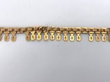 a gold bracelet with numbers on it