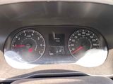 a close up of a car dashboard with a speedometer and gauges