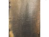 a picture of a metal plate with a hole in it
