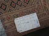 a piece of paper that has been placed on top of a rug