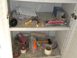 a small cabinet with a lot of stuff in it