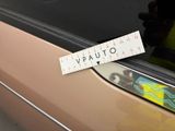 a sticker that says vauto on the side of a car