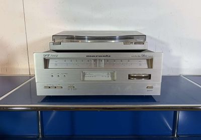 an image of a stereo system sitting on top of a blue table