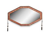 an image of a decorative mirror with tassels hanging from it