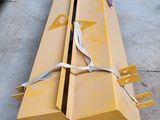 deux morceaux de bois posés par terre