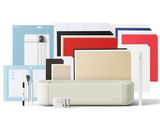 a lot of different types of stationery on the table