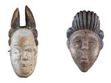 three african masks are displayed against a white background