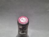 a bottle of beer that is sitting on a table