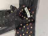 pair of black leather gloves with multicolored buttons on them