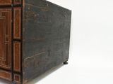 an old wooden cabinet with a door and a drawer