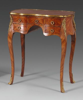 an antique wooden table with two drawers and two drawers