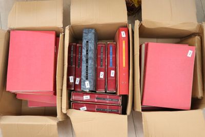 a box full of books that are sitting on the floor