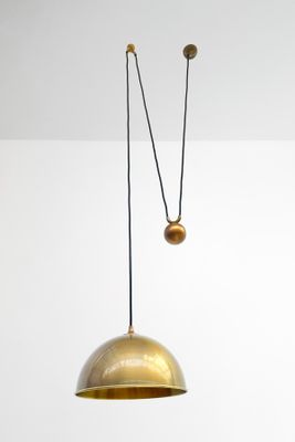 a close up of a light fixture hanging from a ceiling