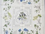 a picture of a table cloth with a picture of a horse and carriage on it