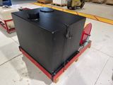 a large black box sitting on top of a pallet