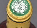 a close up of a bottle of liquor with a label on it