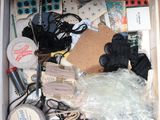 a box full of assorted items sitting on the floor